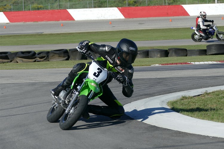 Super Sonic School instructor Jared Walker aboard a Kawasaki KLX110R modified for road racing use. 